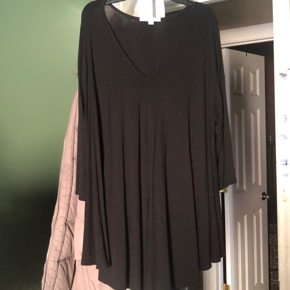 Tunic length black top. Pair it with leggings!